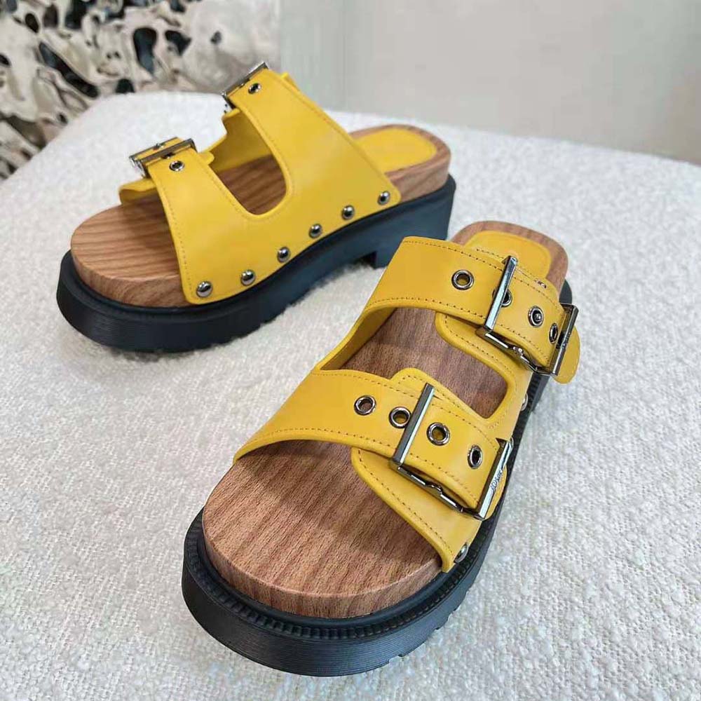 Top-down angle of Dior Women Diorquake Strap Sandal yellow calfskin sandal