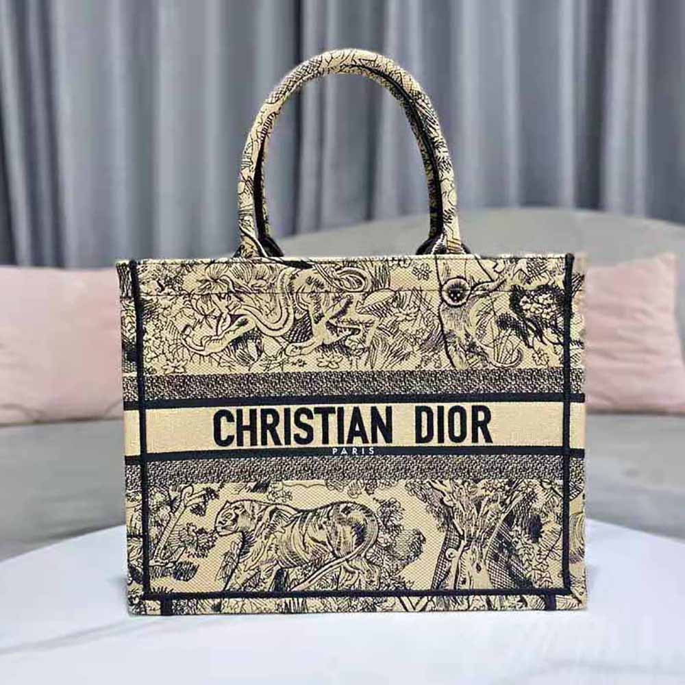Side angle showing silhouette of Dior Women Medium Dior Book Tote Brown Toile de Jouy
