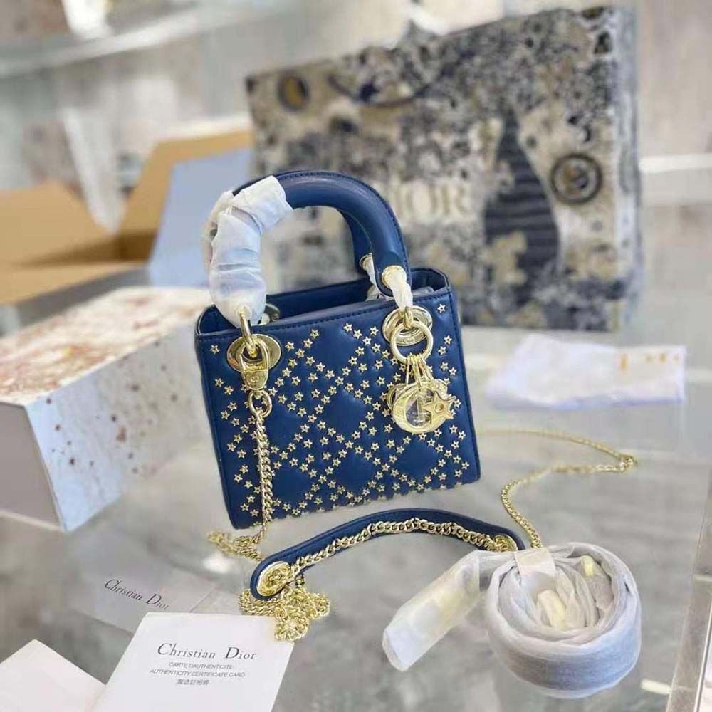 Close-up of Cannage stitching and Lucky Star charm on Dior Women Mini Lady Dior Bag