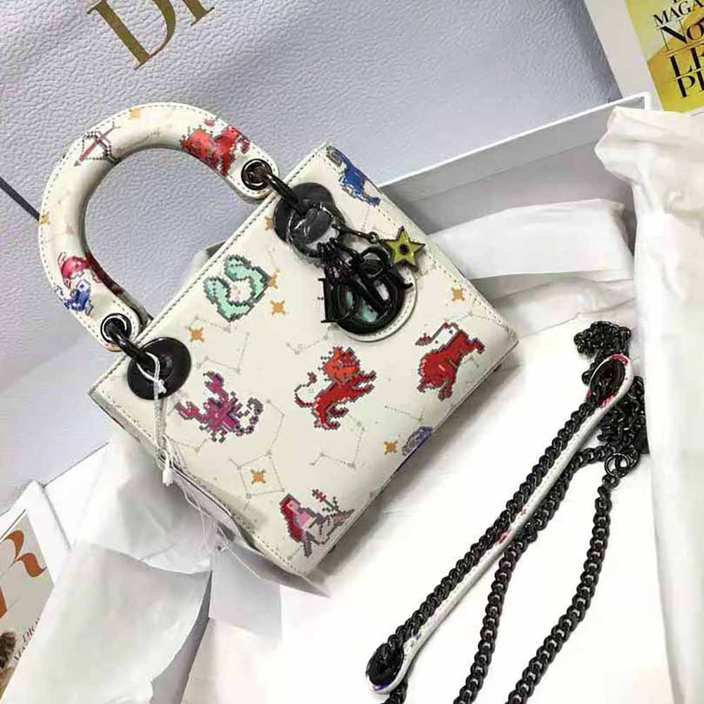 Close-up of pixel zodiac print detail on the Dior Women Mini Lady Dior Bag