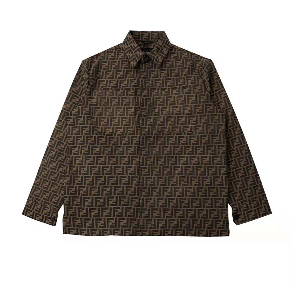 Close-up of Fendi logo hardware on brown fabric jacket sleeve