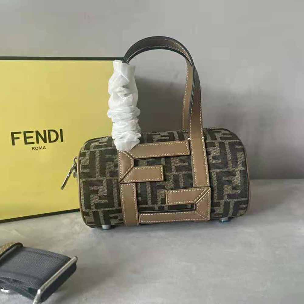Close-up of the gold hardware and brown FF fabric on Fendi Men Mini Bag