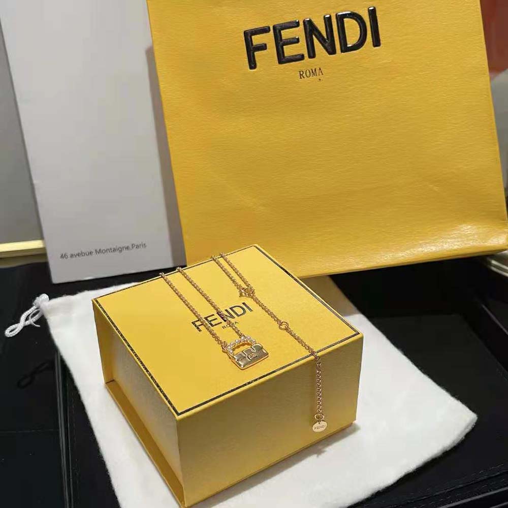 Side profile of Fendi Women Baguette Necklace Gold-Colored highlighting clasp