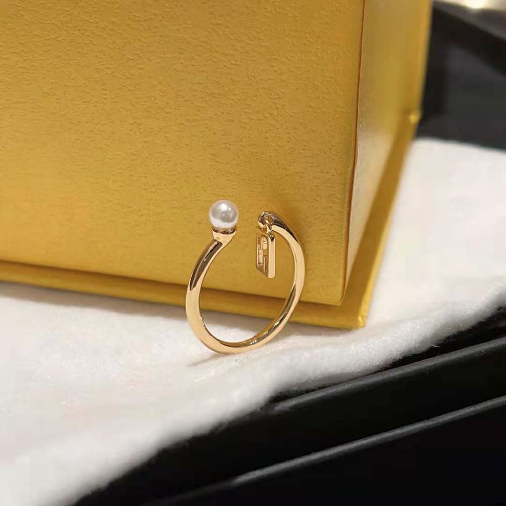Side angle of Fendi Women Baguette Ring Gold-Colored showcasing polished finish