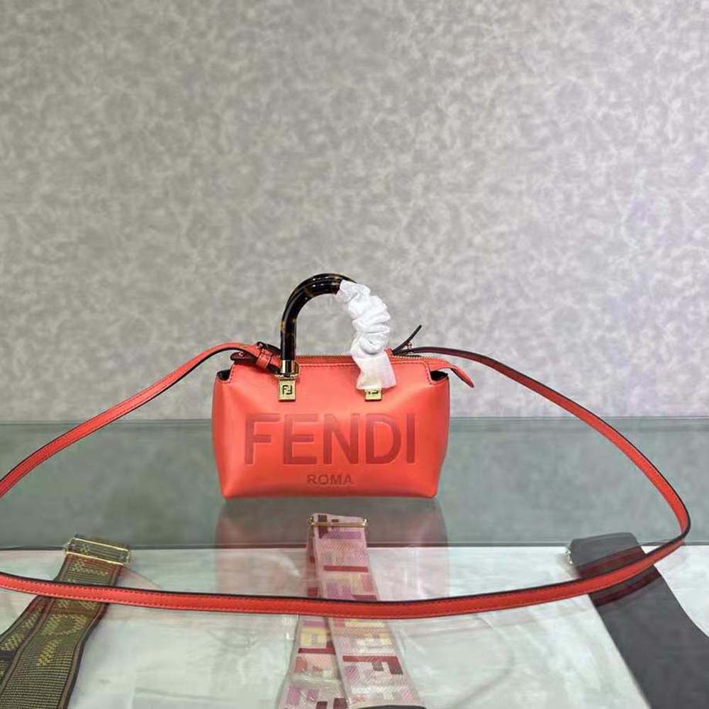 Close-up of gold-tone hardware on Fendi Mini Red Leather Boston Bag
