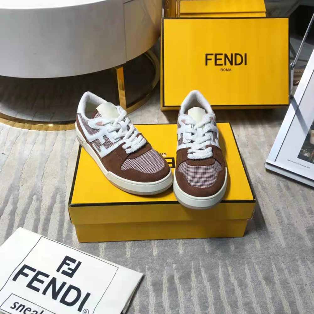 Top-down angle showing lace-up closure on Fendi Match low-tops