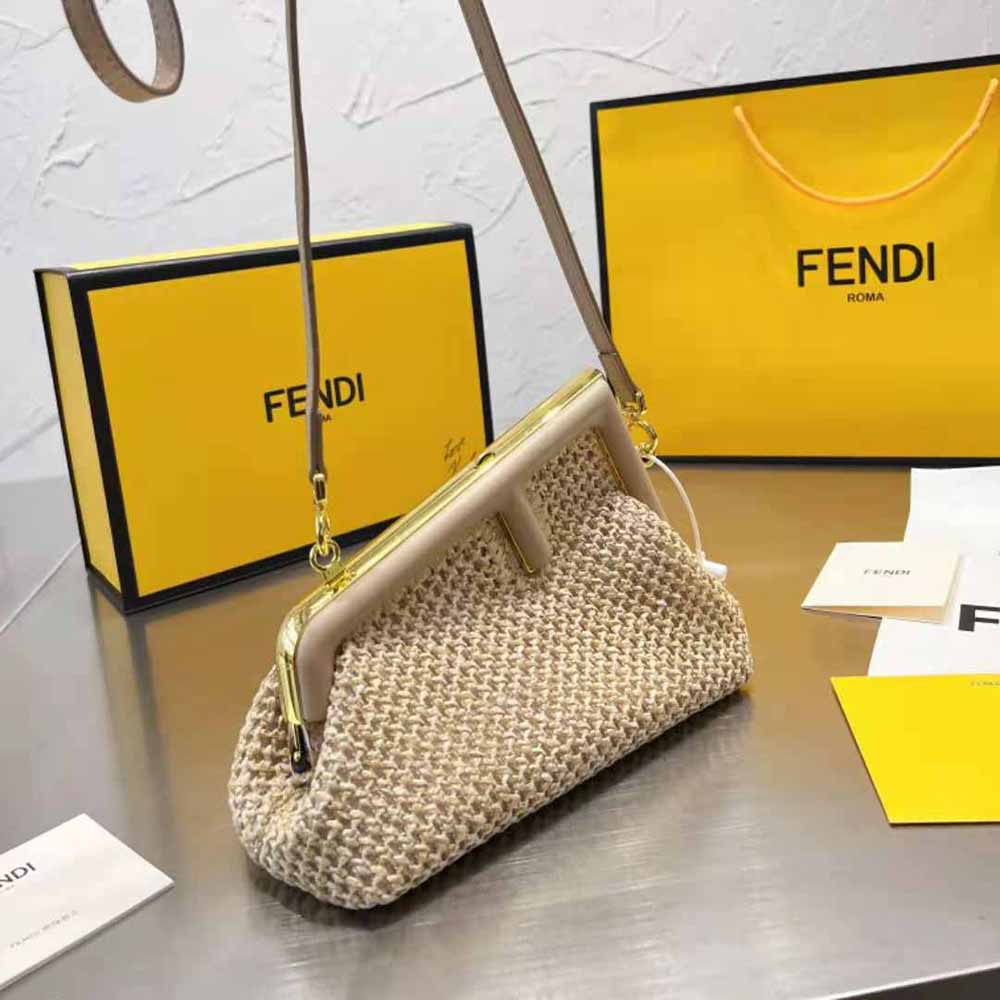 Close-up of woven raffia texture on Fendi Women First Small Beige Raffia Macrame Bag
