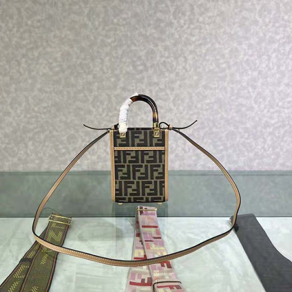 Side view showing silhouette of Fendi Women Mini Sunshine Shopper mini-bag