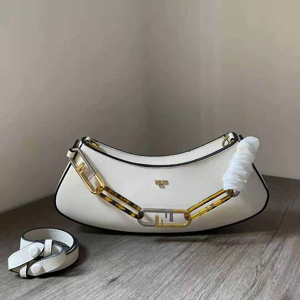 Close-up of gold O’Lock clasp on Fendi Women O’Lock Swing Camellia Leather Pouch