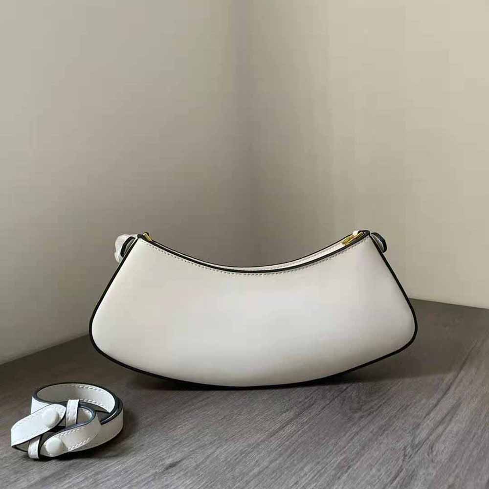 Side profile highlighting smooth leather and Camellia detail on Fendi pouch