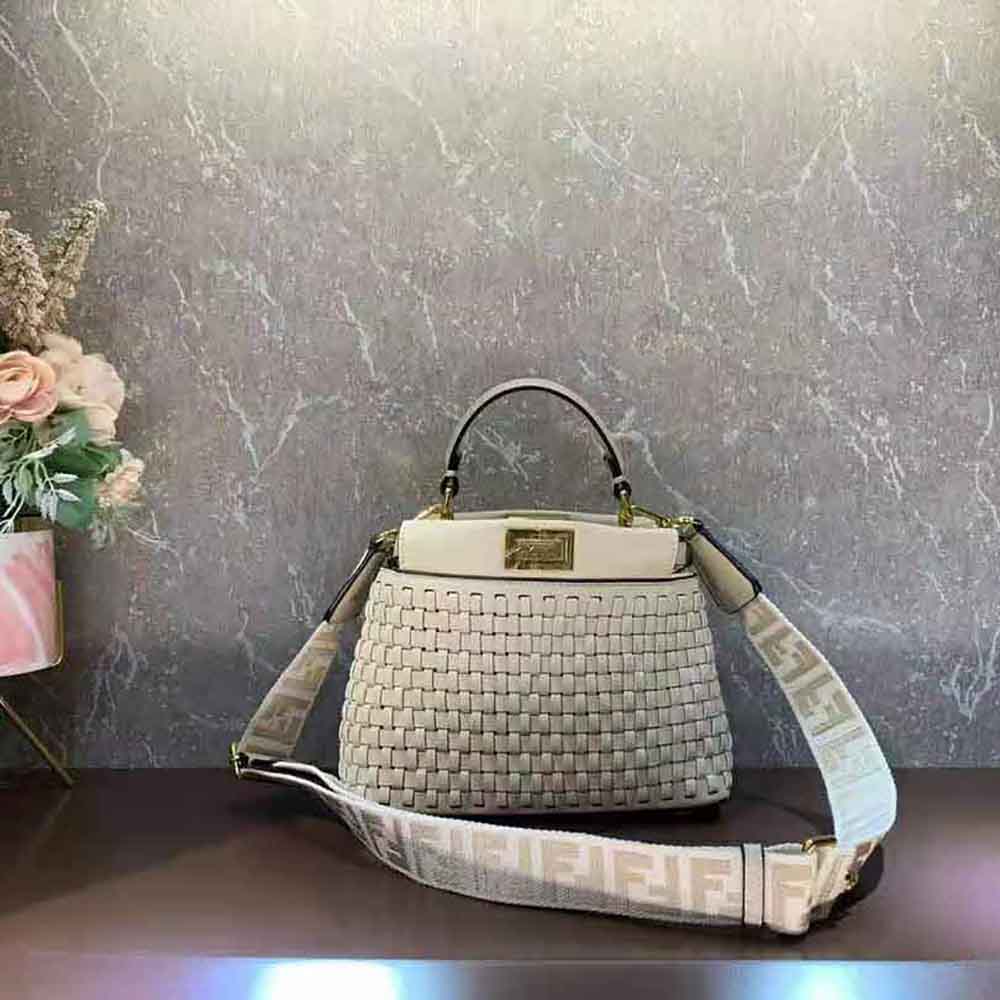 Side angle of Fendi Women Peekaboo Mini Beige Braided Leather Bag with gold hardware