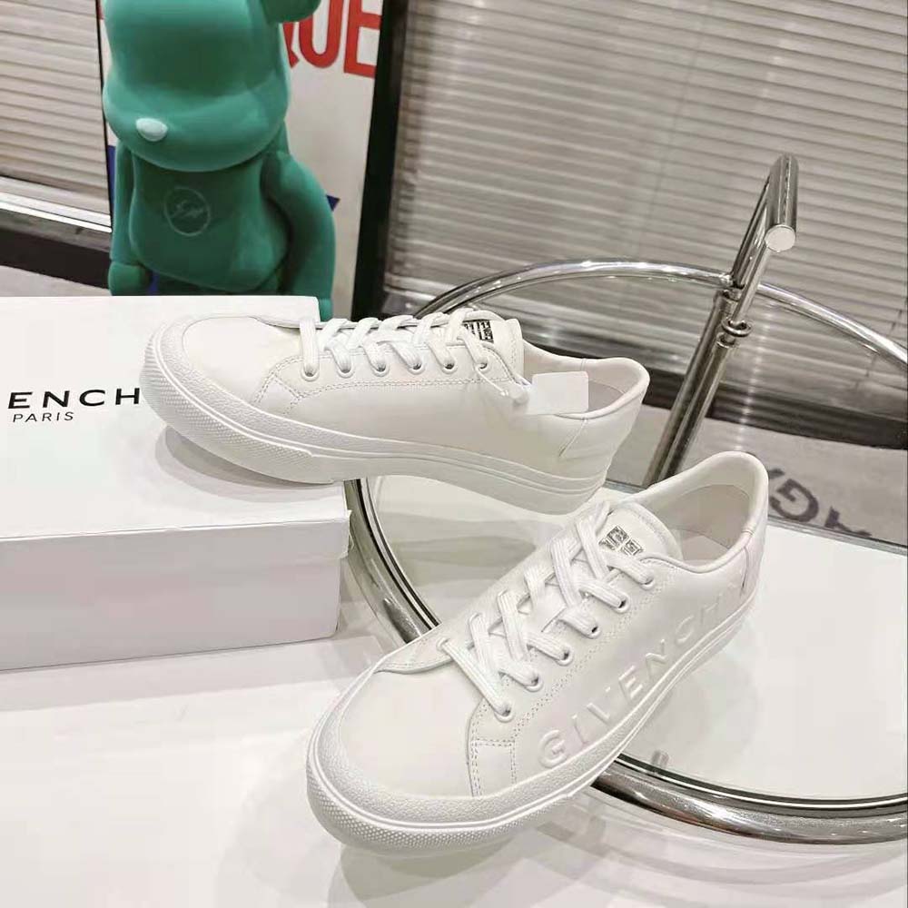 Top angle showcasing lace-up closure and sleek silhouette of Givenchy sneakers