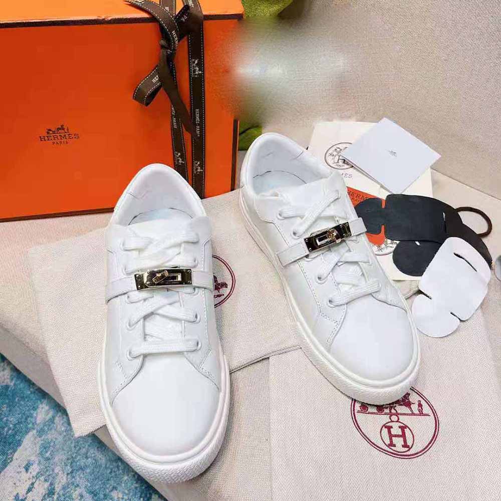 Top view showing lace closure on Hermes Women Day Sneaker white