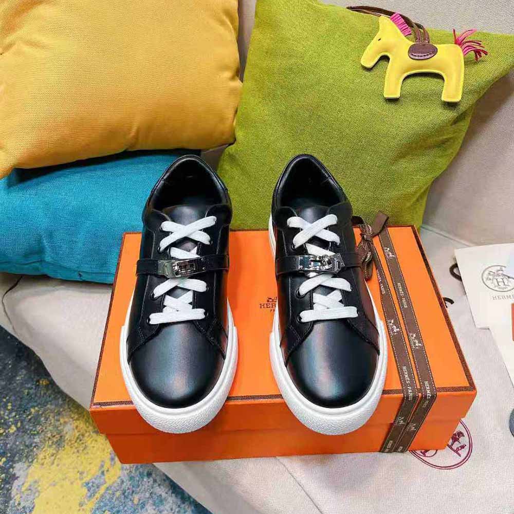 Close-up of shiny black hardware on Hermes Women Day Sneaker