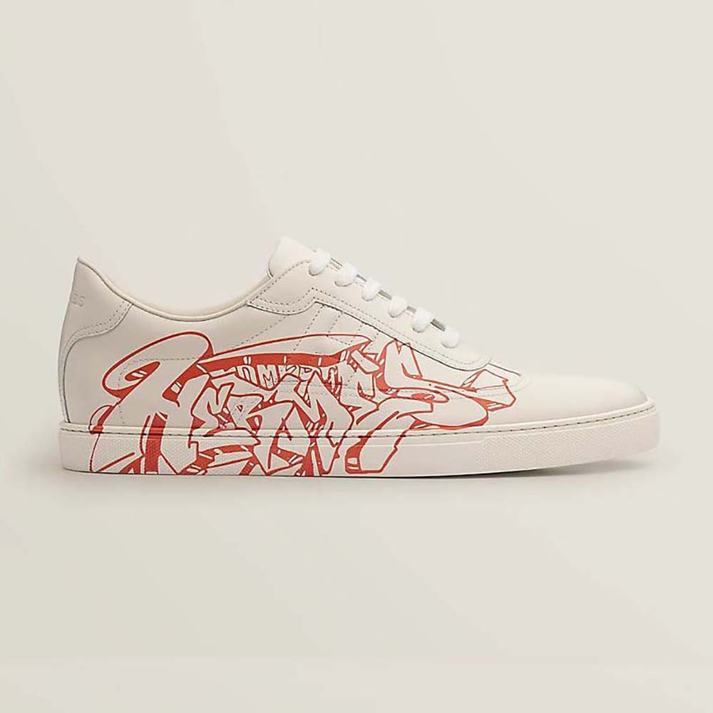 Side profile of Hermes Women Quicker Sneaker showing calfskin and H detail