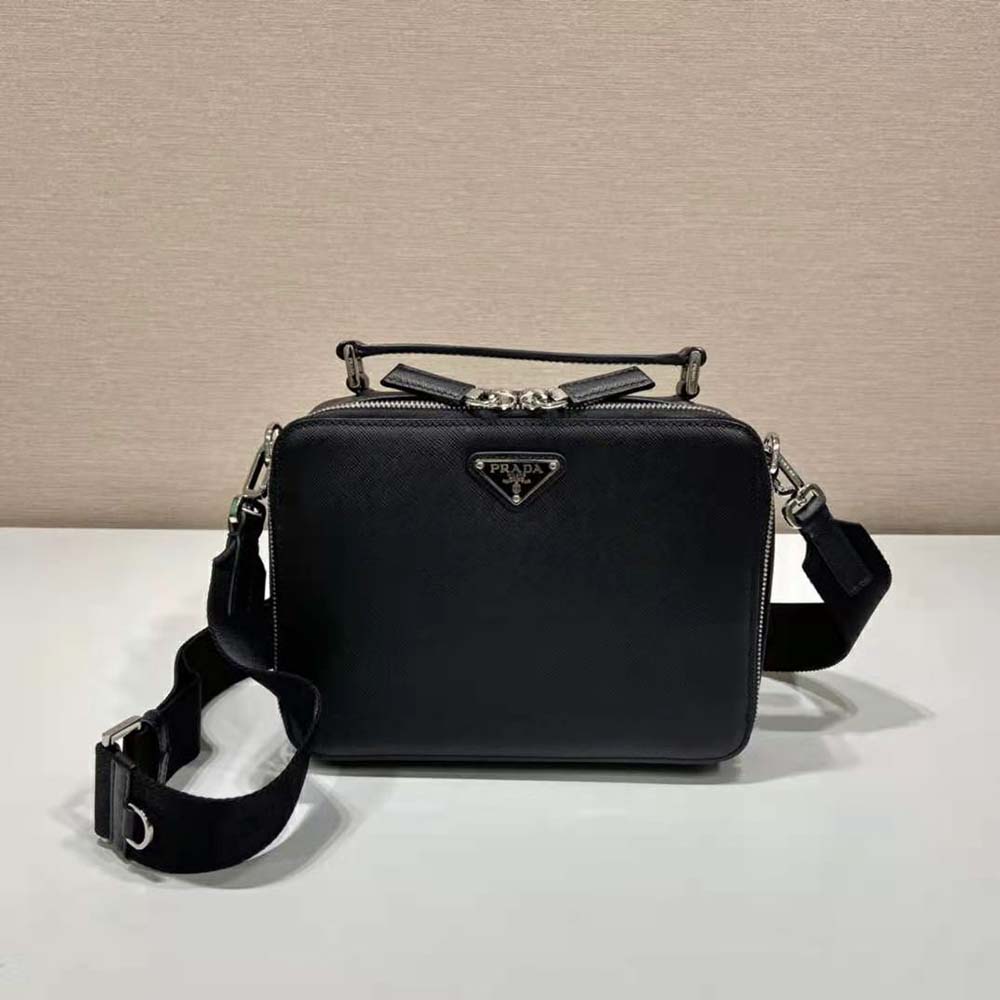 Side shot highlighting structured silhouette of Prada Men Brique Saffiano Leather Bag