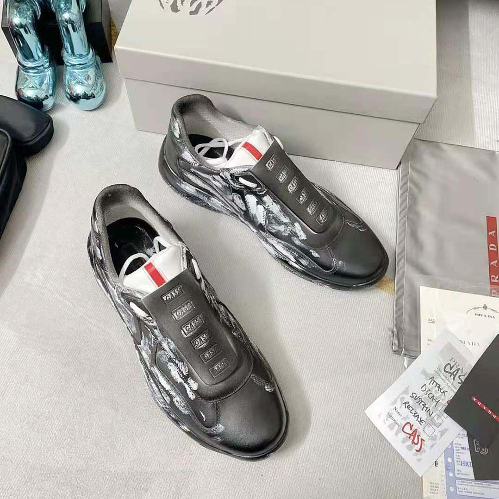 Overhead view showing laces and leather texture of Prada Unisex Cass x Prada Americas Cup D3cay Sneakers-Black