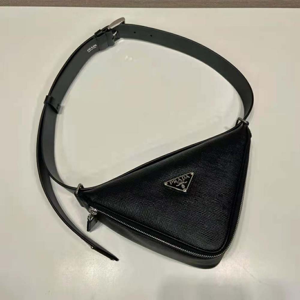Side angle showcasing polished silver closure of Prada Unisex Saffiano Belt Bag