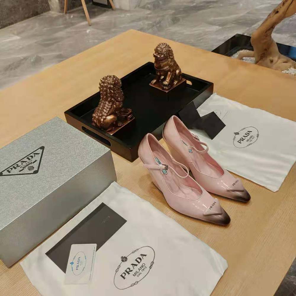 Overhead view showing pointed toe and slip-on silhouette of Prada pumps