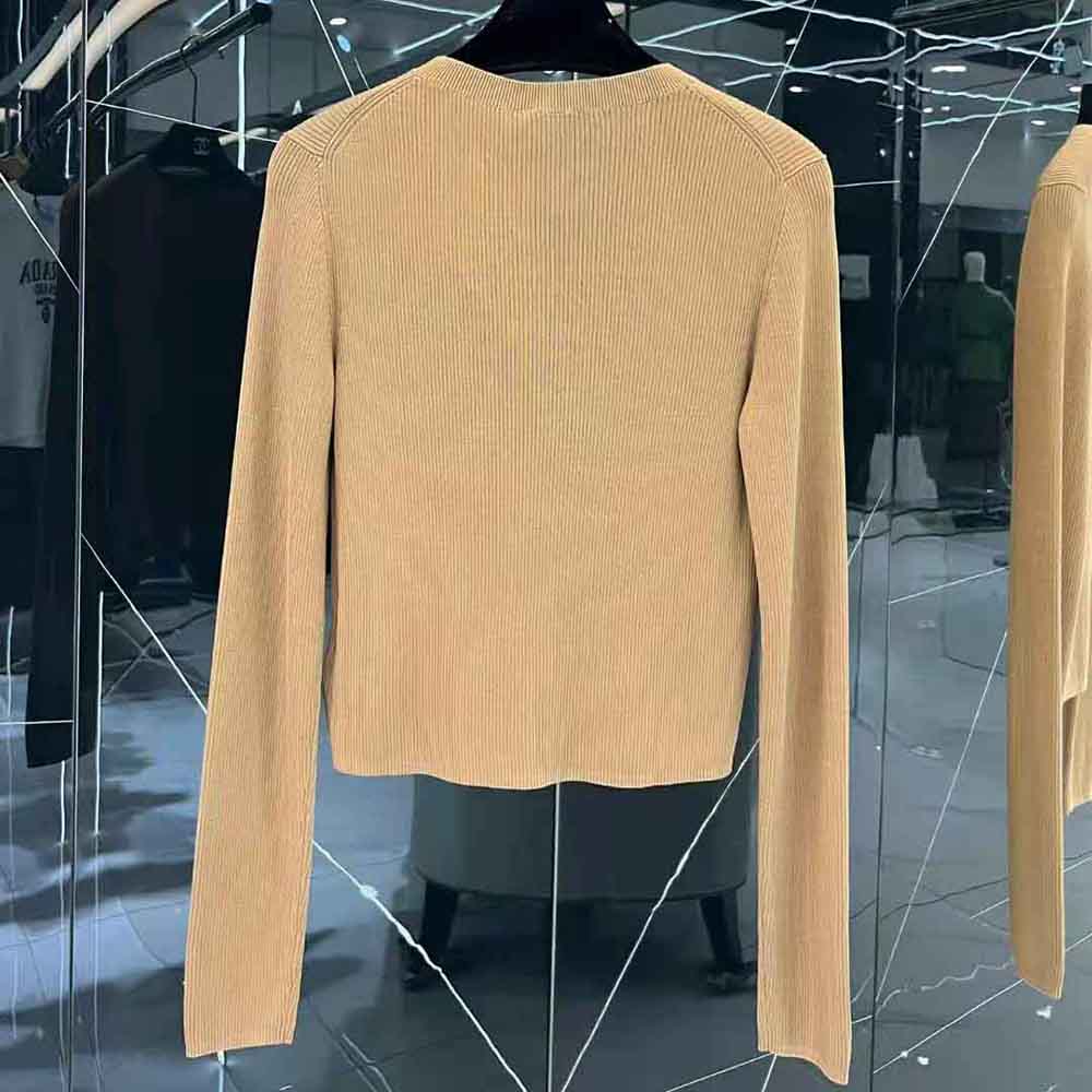 Side angle showing cropped silhouette of Prada Women Silk Sweater