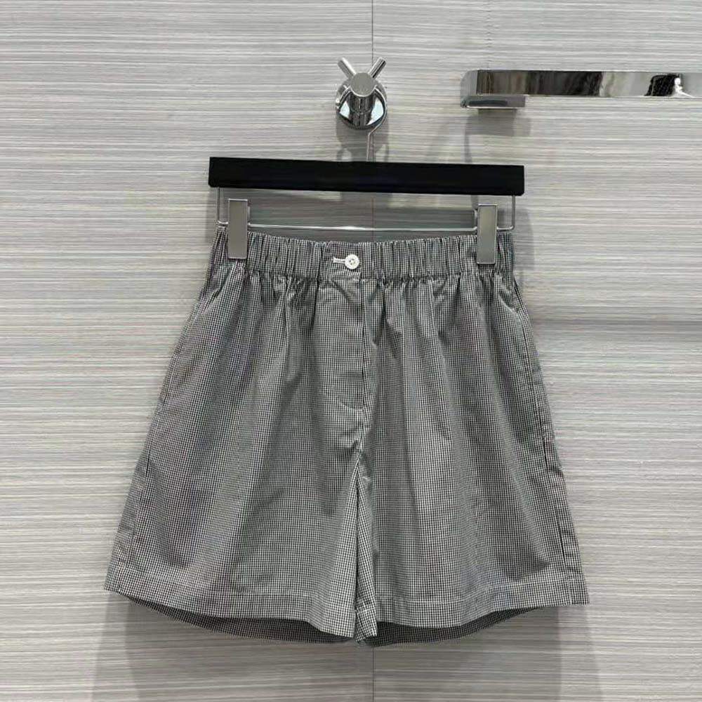 Close-up of Prada logo button on Women Gingham Check Shorts