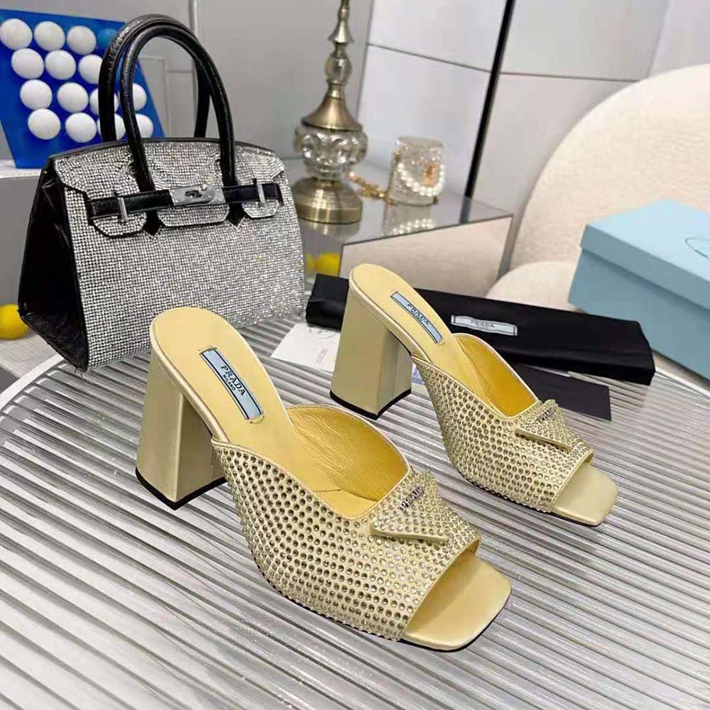 Top angle showing yellow satin and heel on Prada Women High-Heeled Satin Slides