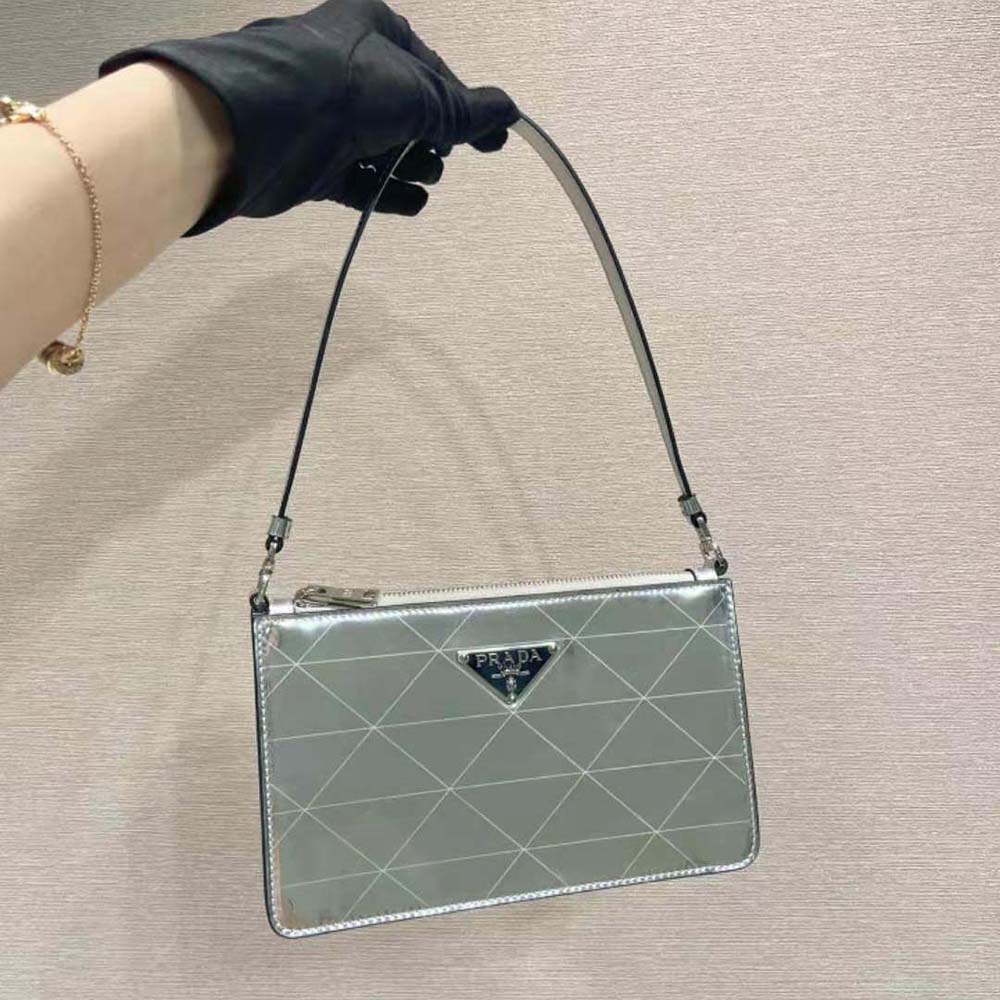 Close-up of silver hardware and Prada logo on Metallic Leather Mini-Bag