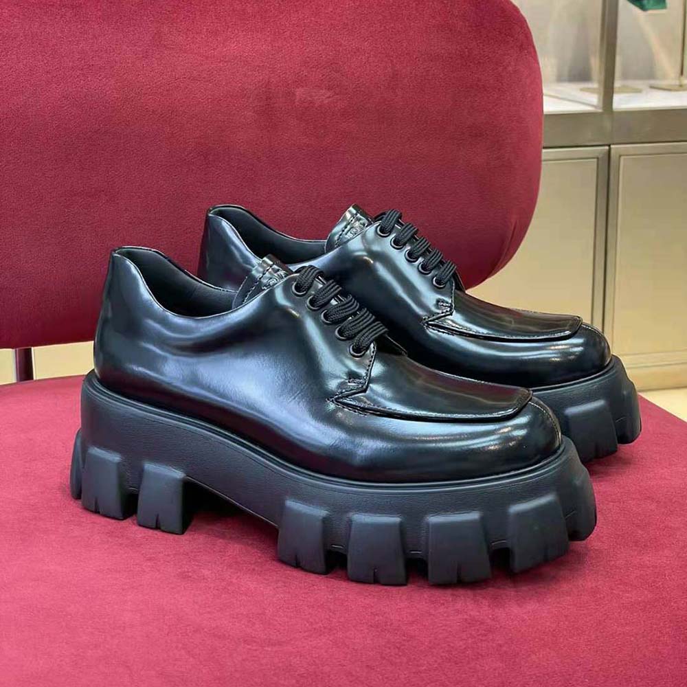 Overhead shot showing lace-up closure on Prada Women Monolith Black shoes