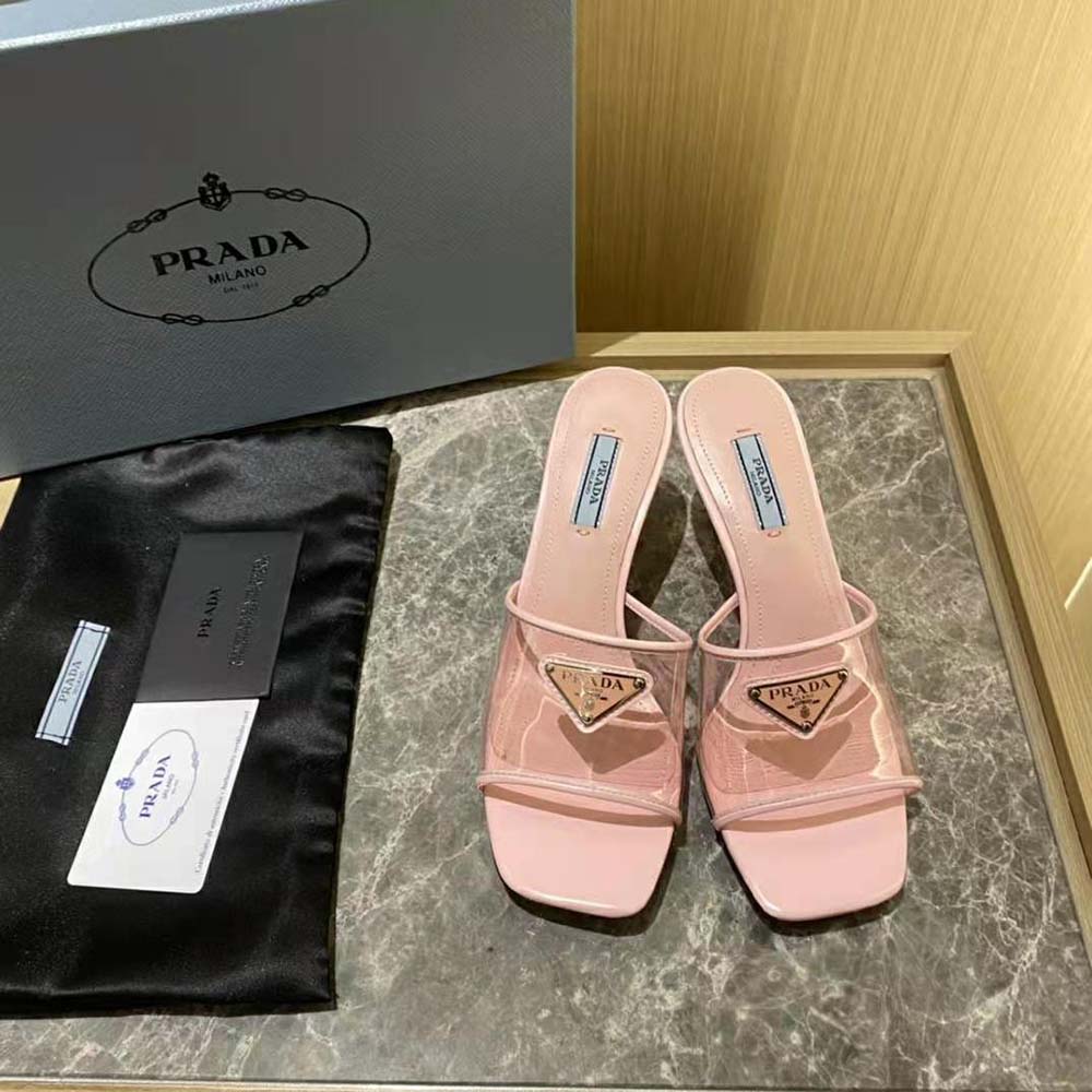 Close-up of varnished heel and patent leather on Prada Women Plexiglas sandals