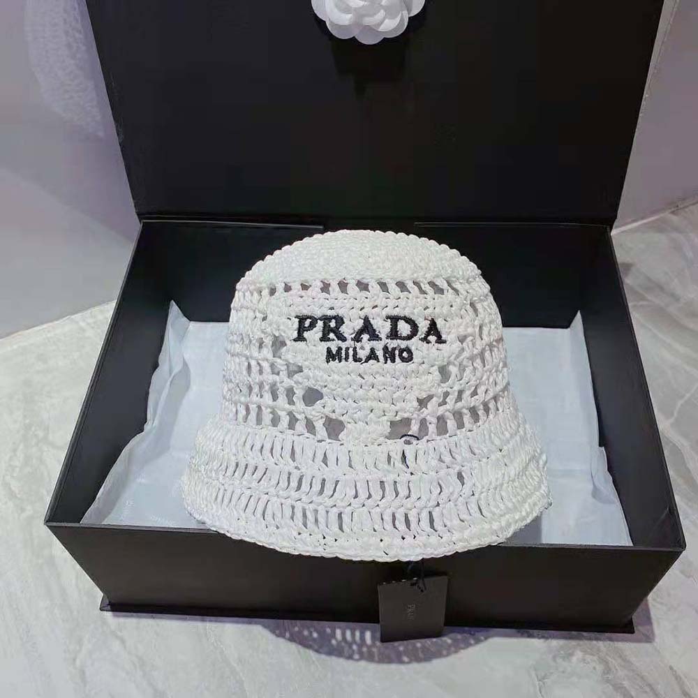 Top down angle of Prada Women Raffia Bucket Hat-White brim