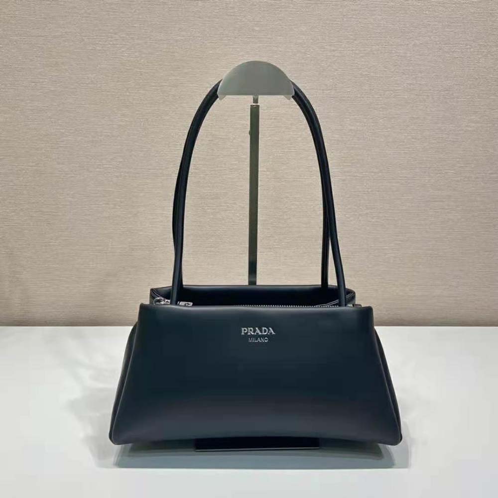 Close-up of silver-tone hardware on Prada Women Small Leather Bag-Black
