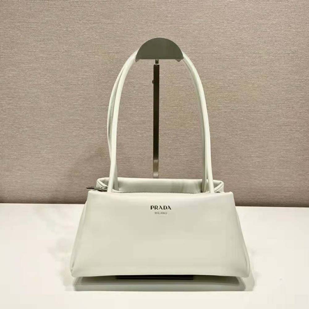 Close-up of silver-tone hardware on Prada Women Small Leather Bag-White