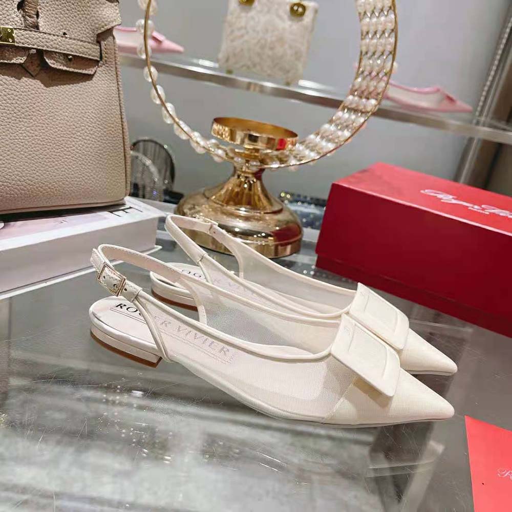 Top angle showing white fabric and slingback strap on Roger Vivier ballerinas
