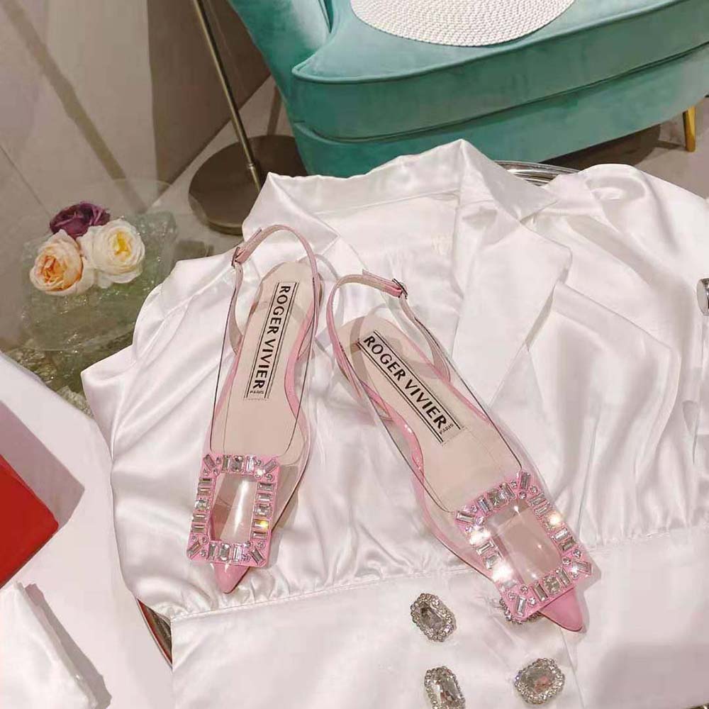 Top-down angle showing pink PVC and slingback strap of Roger Vivier Gommettine ballerinas