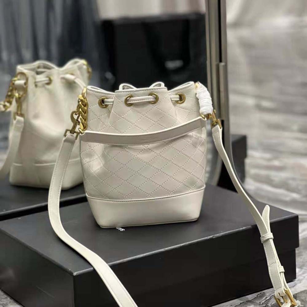 Side angle showing drawstring closure detail on Emmanuelle Small Bucket Bag
