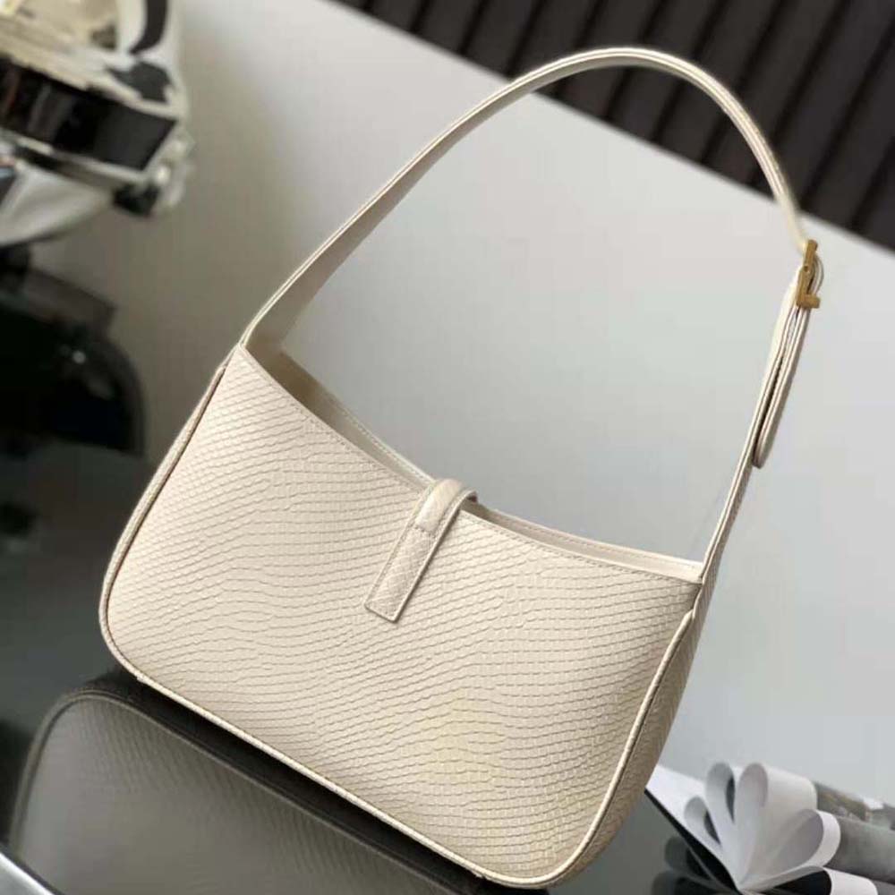 Side profile showing silhouette and soft structure of Saint Laurent YSL hobo bag