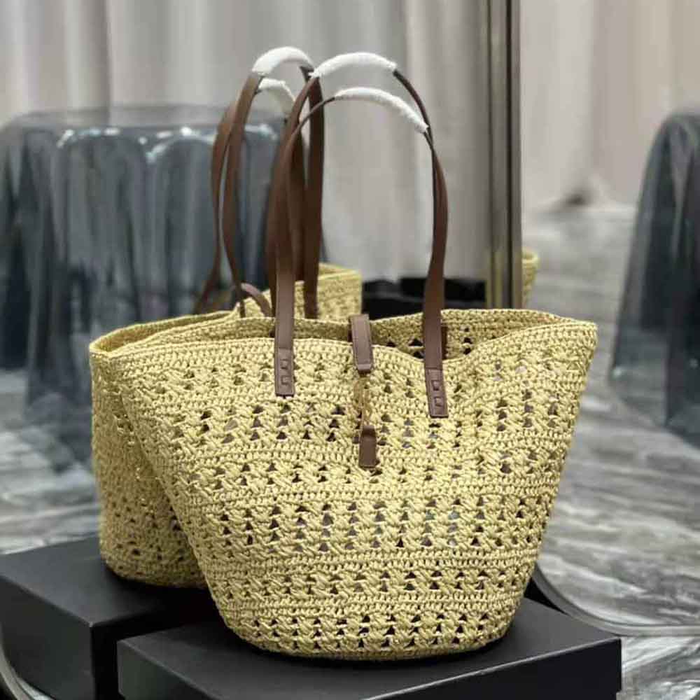 Close-up of gold-tone YSL hardware on Panier Medium Bag in smooth leather