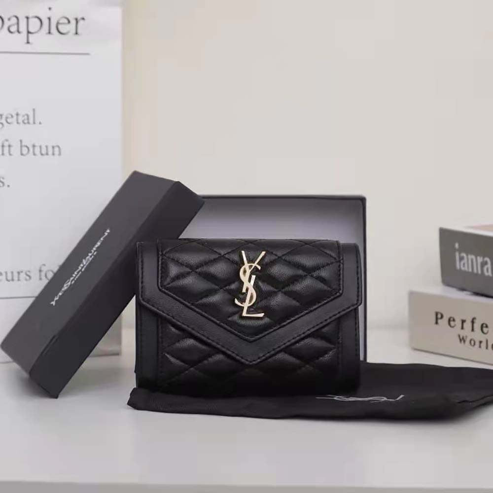 Close-up detail of gold Vlogo signature on Saint Laurent YSL cardholder