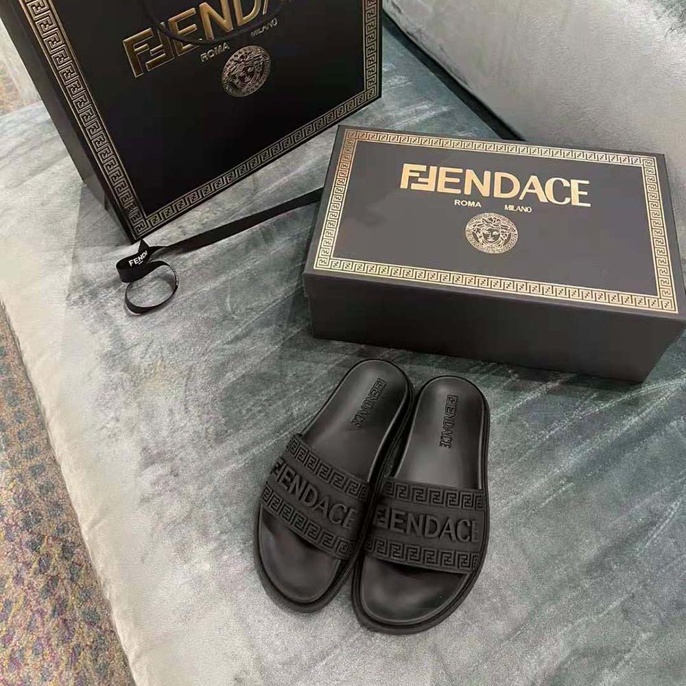 Close-up of Versace Unisex Fendace Logo Sliders-Black embossed branding