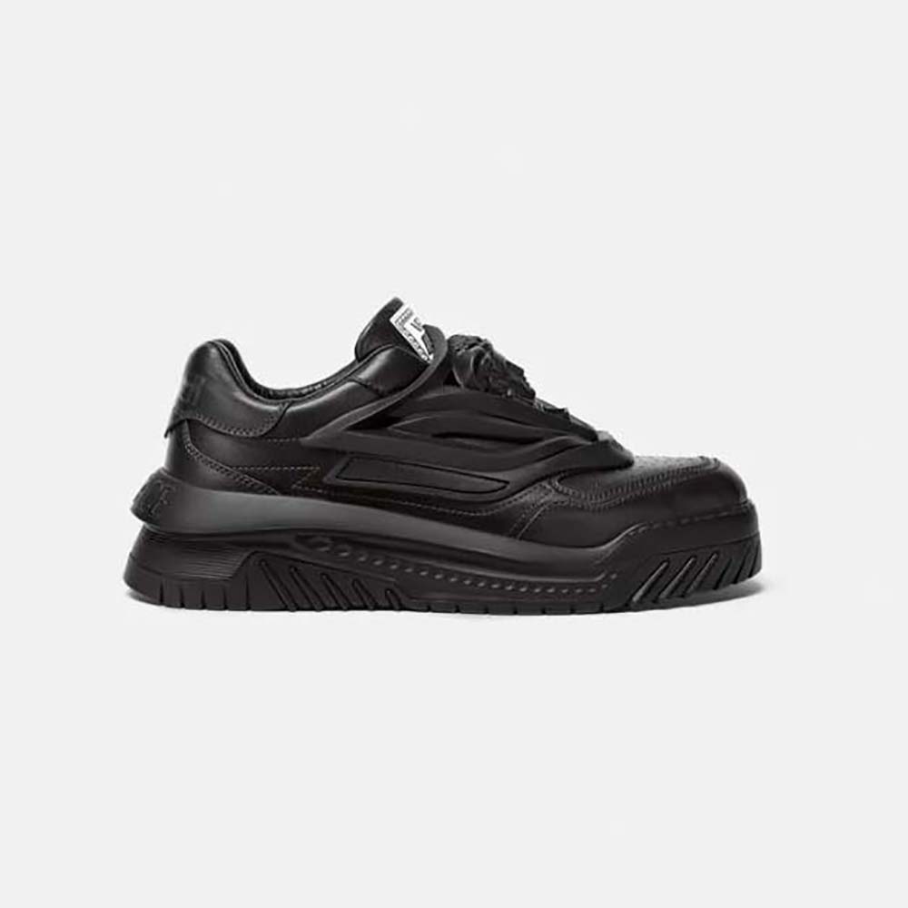 Side angle of Versace Unisex Odissea Sneakers in black leather