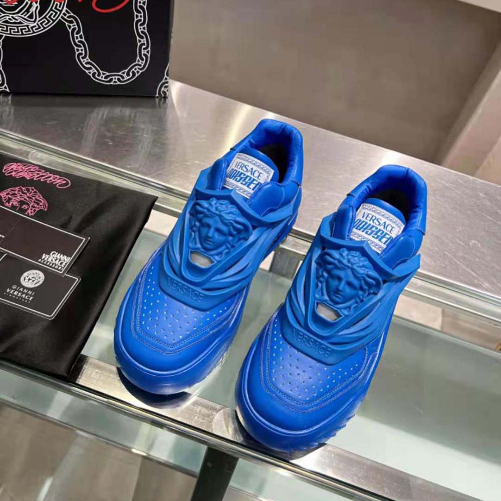 Close-up on perforated toe caps of Versace Unisex Odissea Sneakers