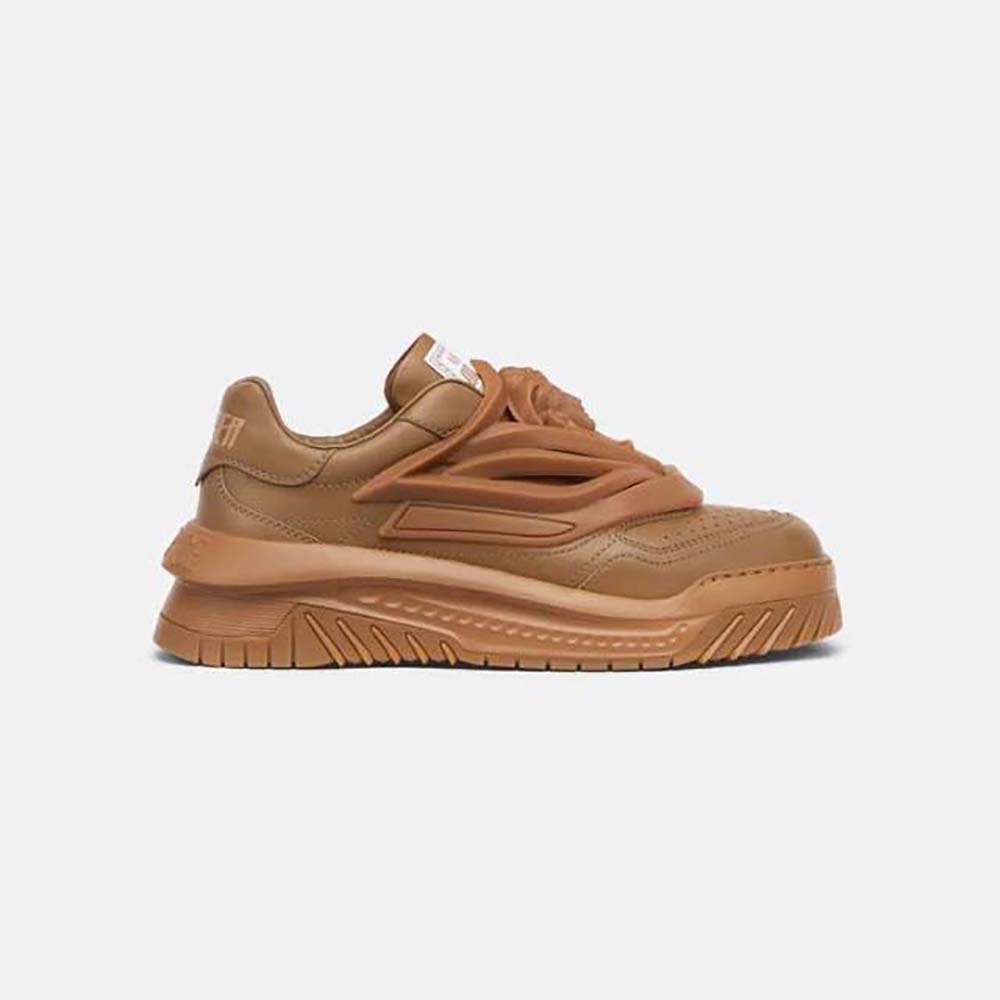 Side profile of Versace Unisex Odissea Sneakers showing brown leather