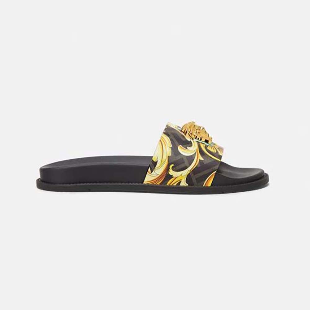 Side angle of Versace Unisex Fendace wild Baroque Sliders-Black showing gold hardware