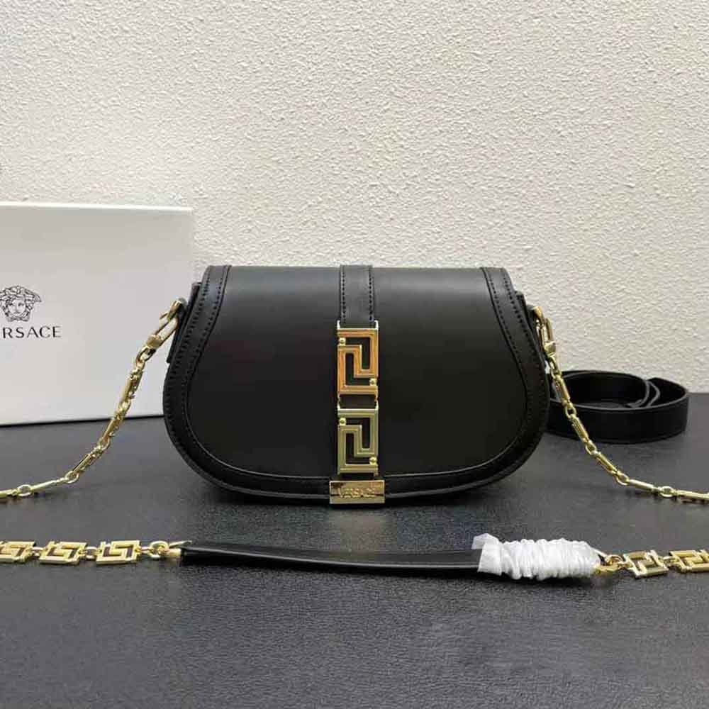 Close-up of gold Medusa hardware on Versace Women Greca Goddess Shoulder Bag-Black