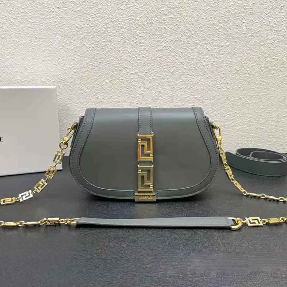 Close-up of gold Medusa emblem on Versace Women Greca Goddess Shoulder Bag-Silver