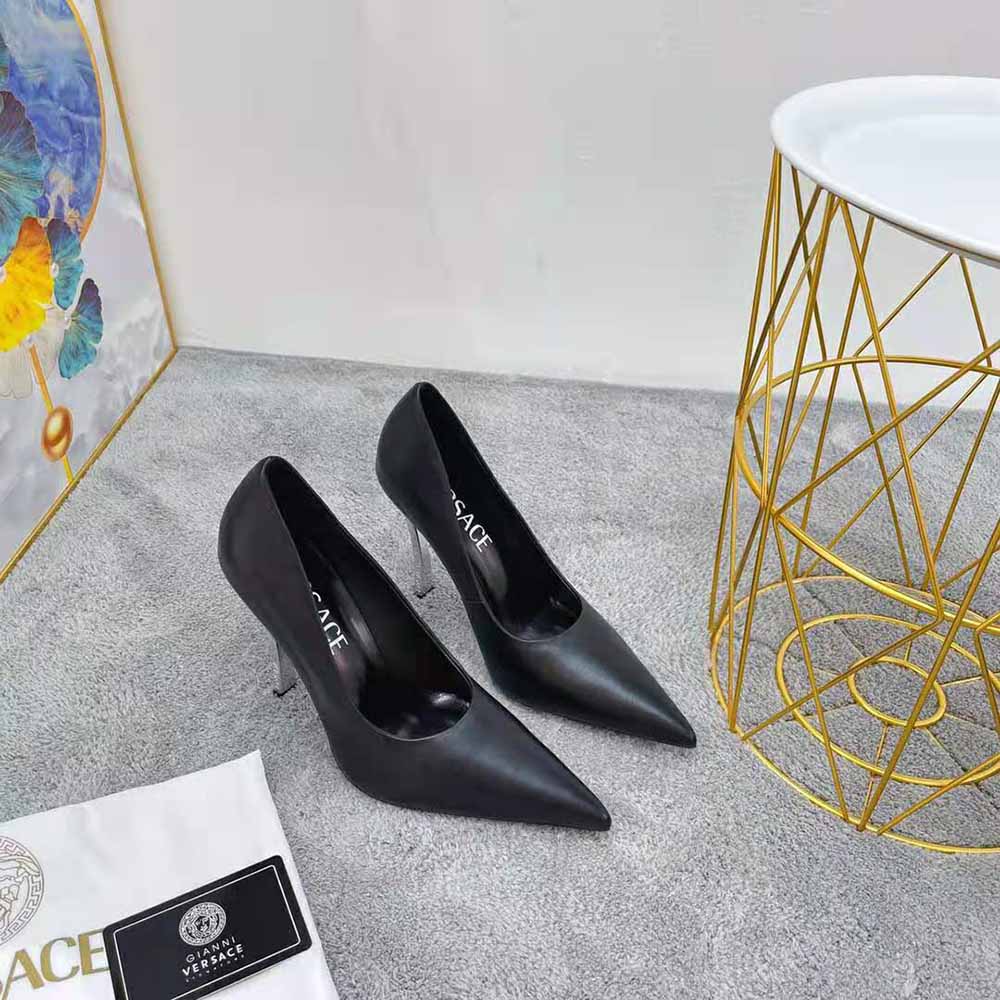 Close-up of gold Medusa hardware on Versace Women Pin-Point Pumps