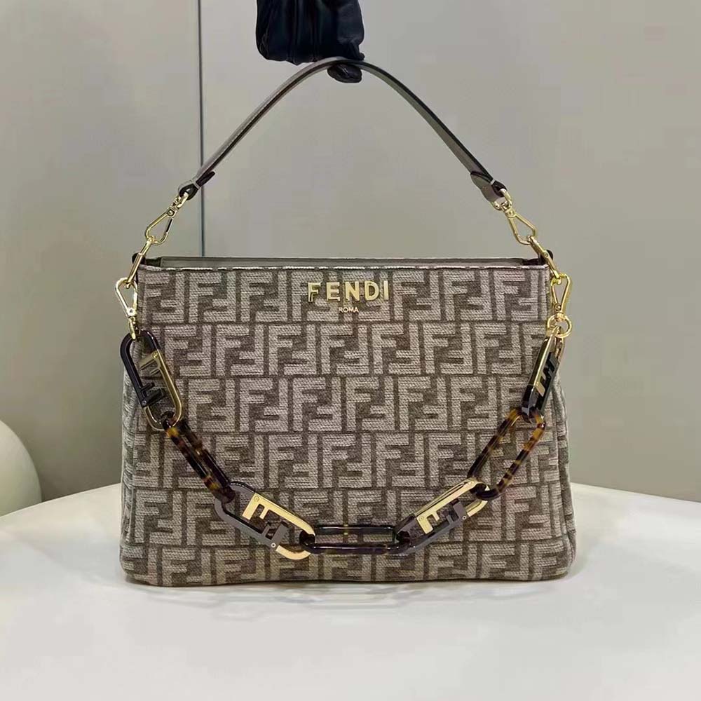Side profile showing silhouette of Fendi Women O’Lock Zip Dark Grey Tapestry Fabric Bag