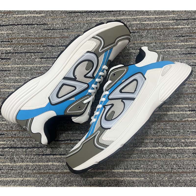 Close-up on Dior signature CD hardware on B30 low-top sneaker