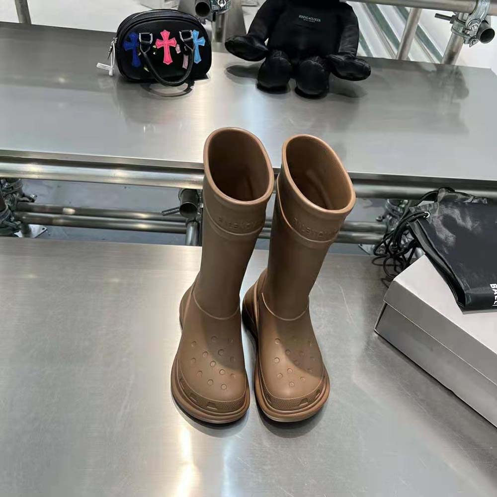 Close-up of signature Crocs™ ventilation holes on Balenciaga boot