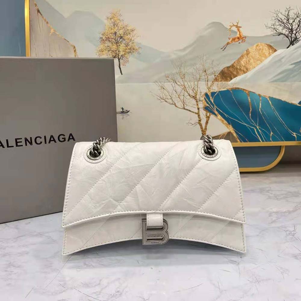 Close-up of silver chain and quilted leather on Balenciaga Women Crush Small Chain Bag